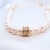 Golden Pearl Embrace Necklace